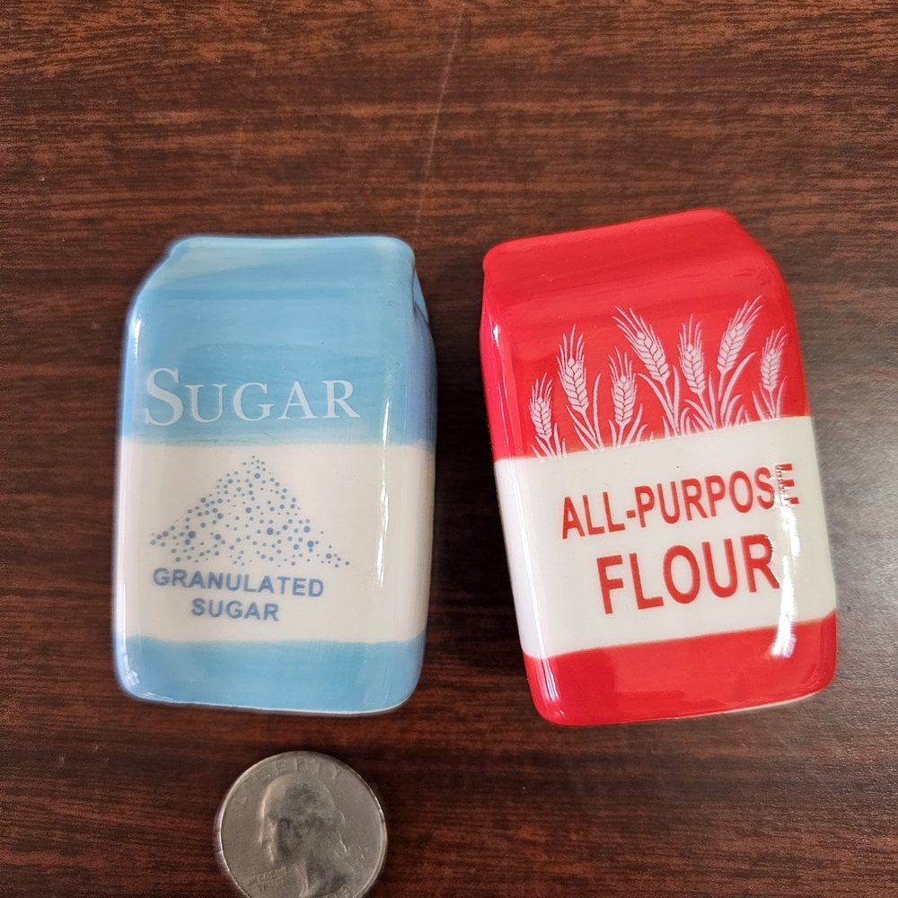 Miniature Salt And Pepper Shakers Shaped As A Sack Of Sugar Flour.